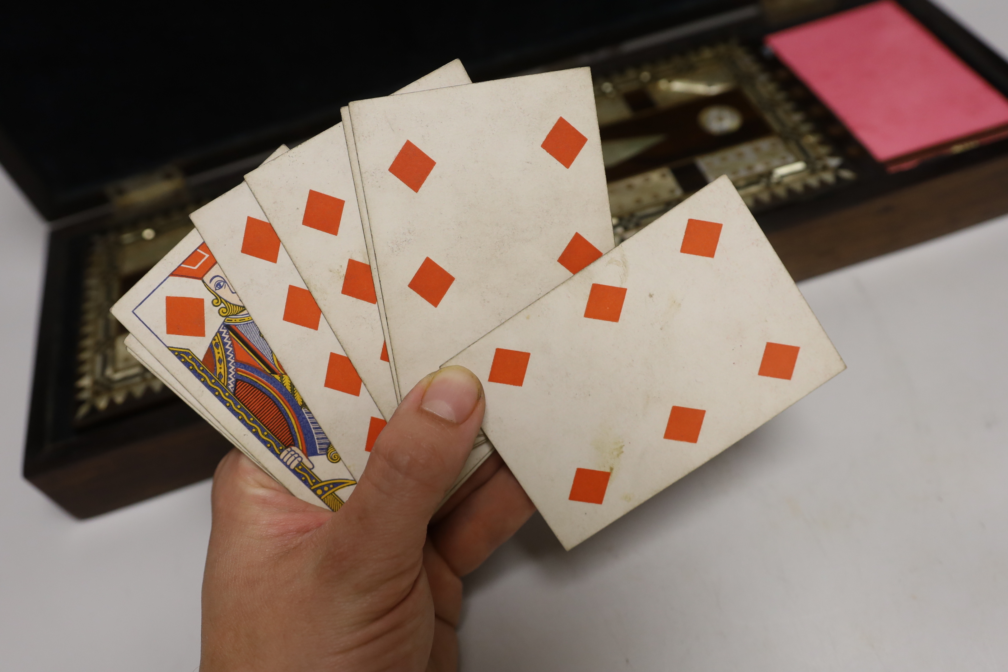 A mother of pearl inlaid rosewood cased cribbage set, with related letter, 1832